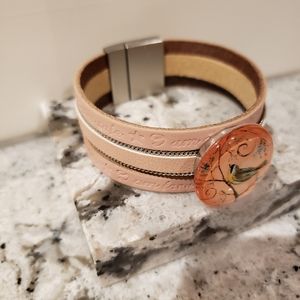 Leather inscribed snap jewely bracelet.